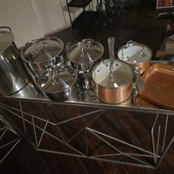 Pots & Pans, Bookshelf, Masks, Entertainment Center. Recliner Couch, Living Room Tables, Samsung Frame Speaker, Piano/Keyboard