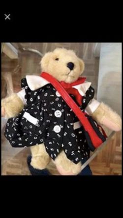 Muffy Vanderbear “Back To school” plush. Jointed bear. 1990 Wearing a black dress with white numbers, carrying a red satchel bag. In great condition