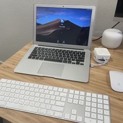 Apple AirMac Laptop With Keyboard And Mouse
