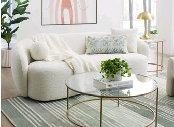 White boucle curved sofa