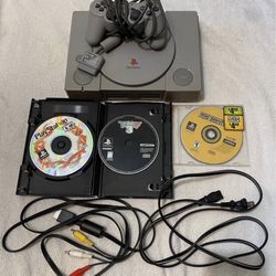 Ps1 console with controller, cords, 3 games & memory card.