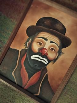 Vintage Framed Sad Clown Painting by Sara
Classic vintage hobo clown portrait artwork in a wood frame, signed "Sara