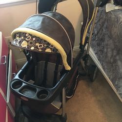 Double Sit And Stand Stroller With Car Seat  Attachment 