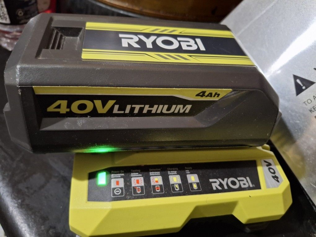 Ryobi 40v Battery and Charger. Read Details