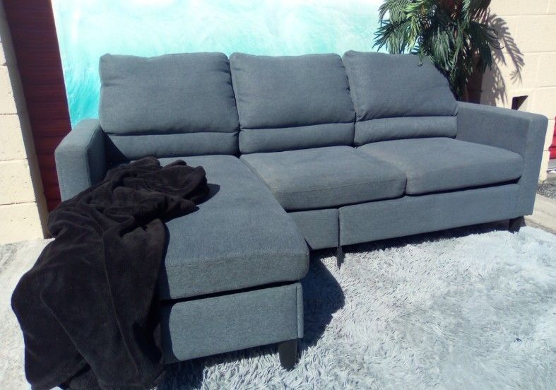Gray Small Sectional with Reversible Storage Chaise