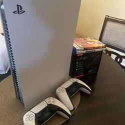 Ps5 Still brand new condition. Only been played a few times. Comes with brand new headphones and 2 controllers. 2 games 
