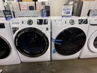 New open box GE white front load washer and gas dryer set