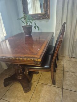 Mesa y 5 sillas
