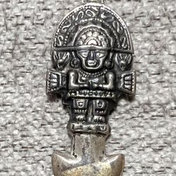 Peruvian silver pendant in the form of an Aztec god