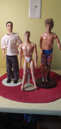 THREE MALE ARTICULATED DOLLS