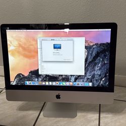 Apple IMac 21.5 inch with the latest software OS X Yosemite 4 GB