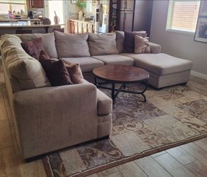 Sectional, Throw Pillows, Rug and Coffee Table