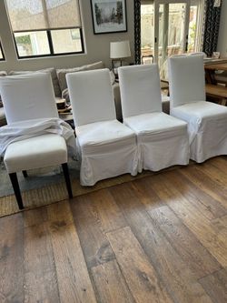 Slip covered dining chairs