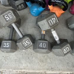 New pair of 35lb and 40lb iron dumbbells 
