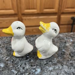 Vintage Ducks Pair of Salt And Pepper Shakers. Size approximately 2 3/4 inches tall. Preowned. Some paint wear due to age. Has been on display in