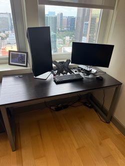 Dark brown and silver office/ video game desk
