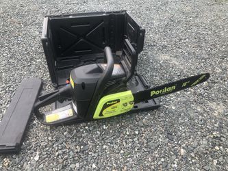 Poulan P3816 gas chainsaw and case runs great