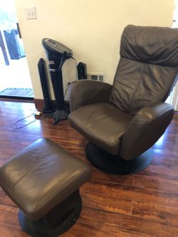 Pottery barn leather rocking / swivel chair with foot stool