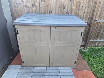 Craftsman horizontal resin storage shed (approximately 34 cu. ft.).