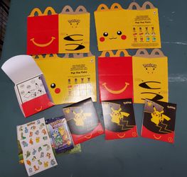 4 McDonald's Pokémon Happy Meal Boxes with Cards and Stickers