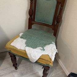 Gorgeous Antique chair with wooden roller wheels