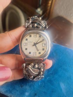 Reloj paul monet las orillas delas flores son plata automatico