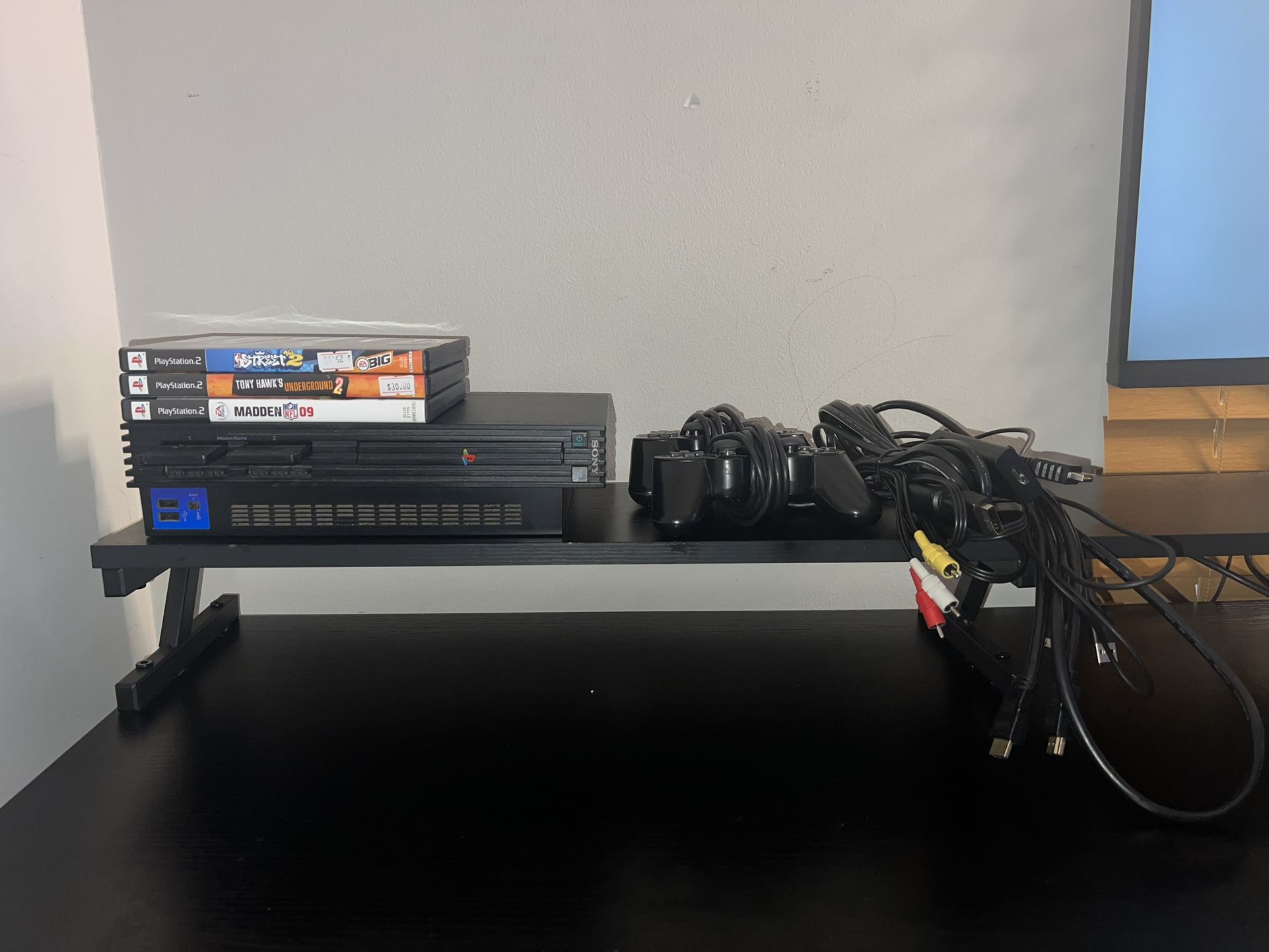PS2/ Two controllers/ 3 8GB memory cards/ PS2 to HDMI Converter
