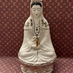 porcelain statue of Guanyin (Kuan Yin), the Buddhist Bodhisattva of compassion
