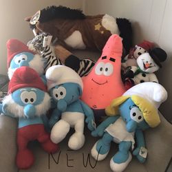 Smurfs And Assorted Plush Toys