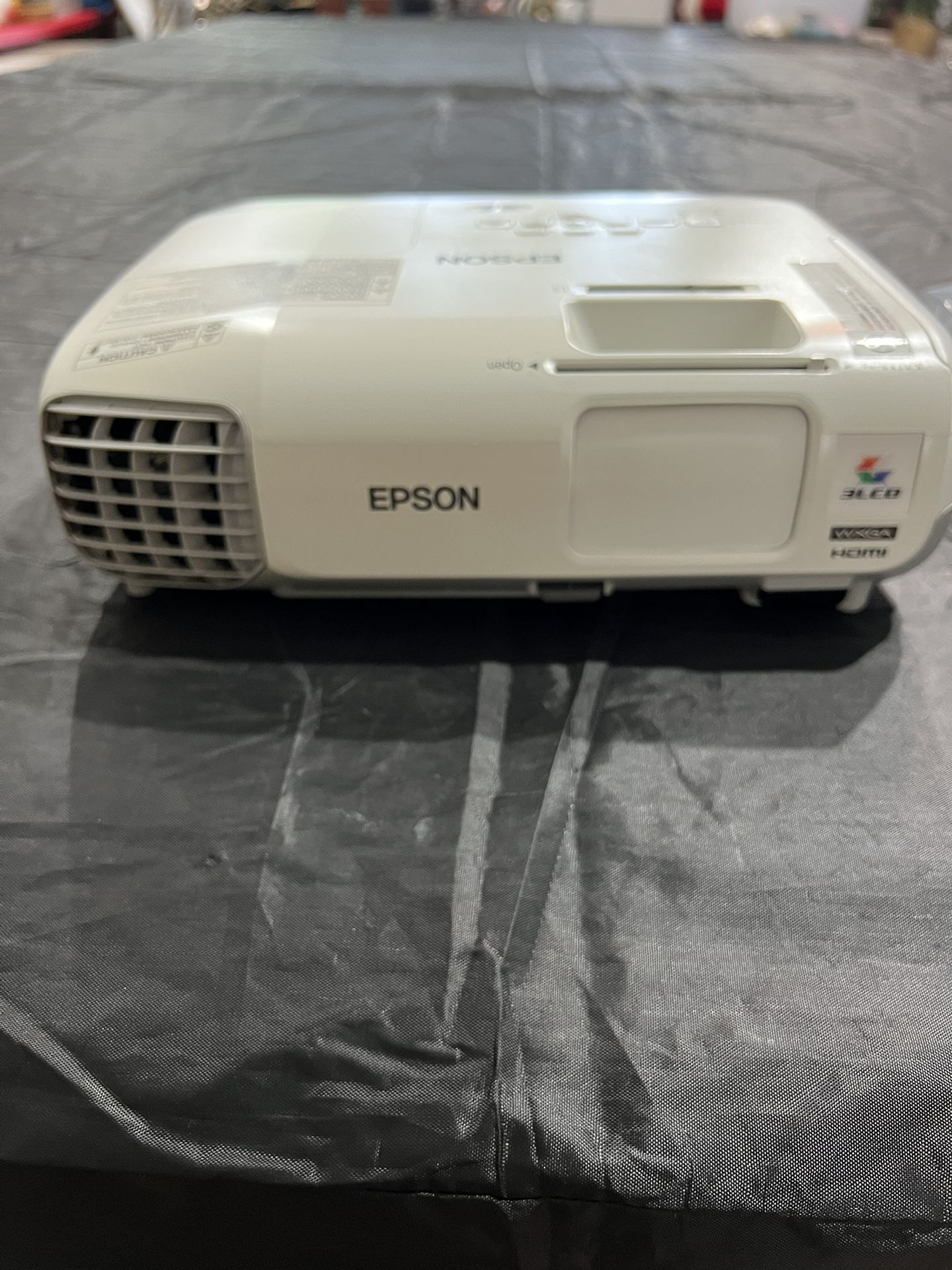Epson PowerLite 99wh projector and electronic screen with brackets.