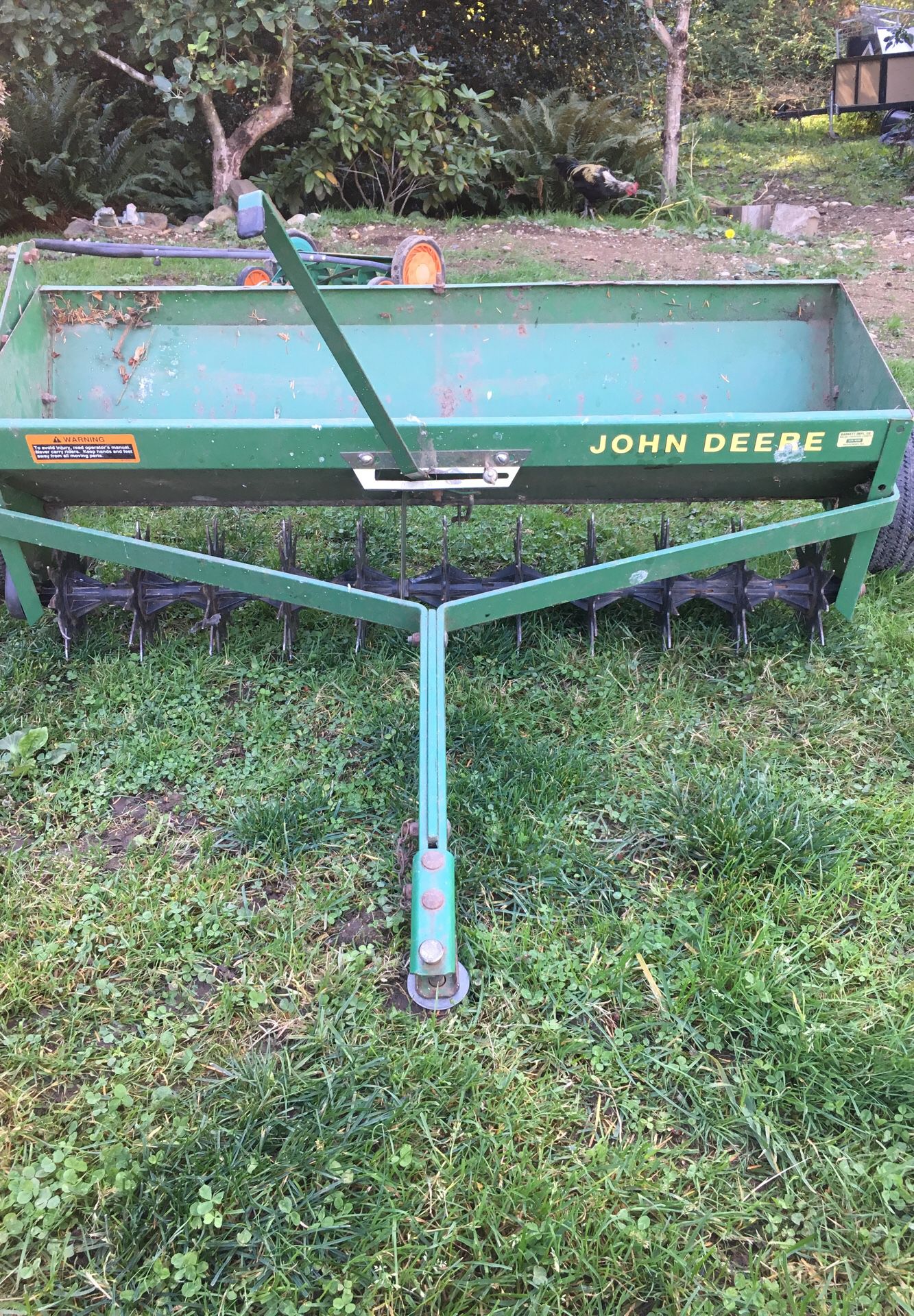 John Deere aerator and seeder.