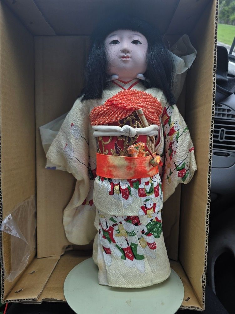 Oriental Porcelain Doll