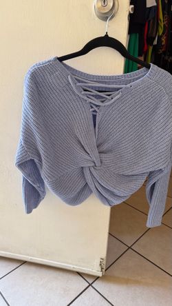 Light blue sweater