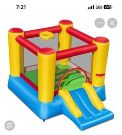 Inflatable kids bounce house with hoop and slide