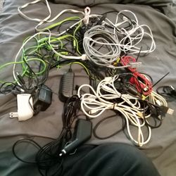 Lots Of Min Usb And iPhone And Tablet Charging Cords 