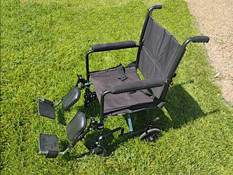 Adult Transport Style Wheelchair - Padded Leg / Foot rests