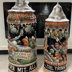 2 VINTAGE GERMAN BEER STEIN MUG HAND PAINTED ANTIQUE "IN DURST'GER MIT ALL SORGEN" 11”H & 10”H