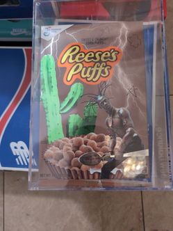 Travis Scott x Reese's Puffs Cereal with acrylic case