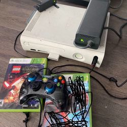 xbox 360 with 7 games, wi-fi adapter, and 2 storage devices