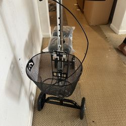 Brand new Drive Medical Dual Pad Steerable Knee Walker with Basket, also known as a knee scooter in black