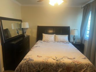 Dark Wood Bedroom Set with Bed, Dresser, and Nightstand