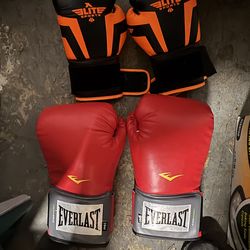 Punching bag with gloves.