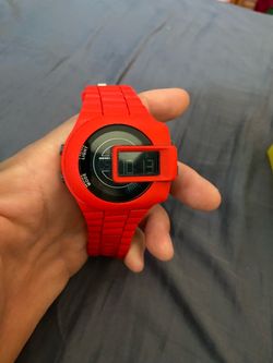 This is a bright red Diesel Viewfinder digital watch, model DZ7276, featuring a bold rubber case and matching silicone strap.