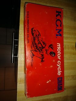 Kcm motorcycle chain made in Japan new 60 bucks Farm part number 63088 l and they're made in Japan