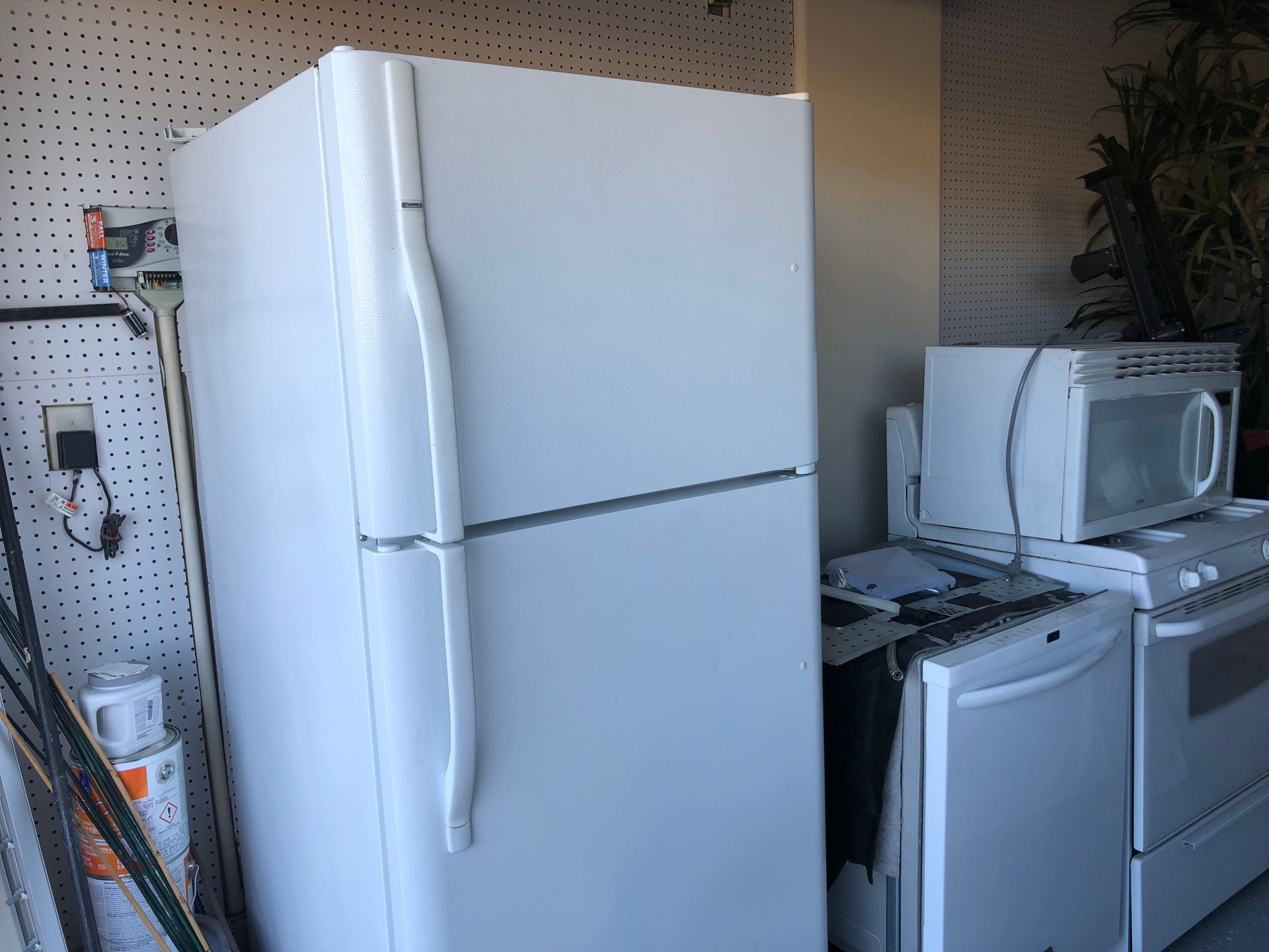 Kenmore refrigerator W/ ice maker, micro wave and oven
