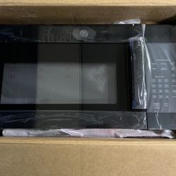 GE over the range microwave Black in Color (NIB)