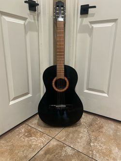 Black acoustic guitar