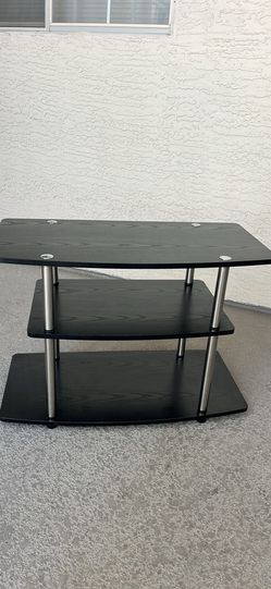 Brand new black shelf can be used for media, shoes, decor or anything really! 32”16”22”