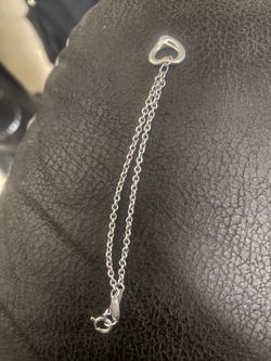 TIFFANY & CO OPEN HEART BRACELET. PRICE IS NEGOTIABLE!!!!