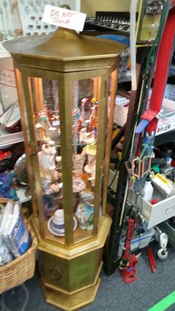 62" height.. GOLD. CURIO